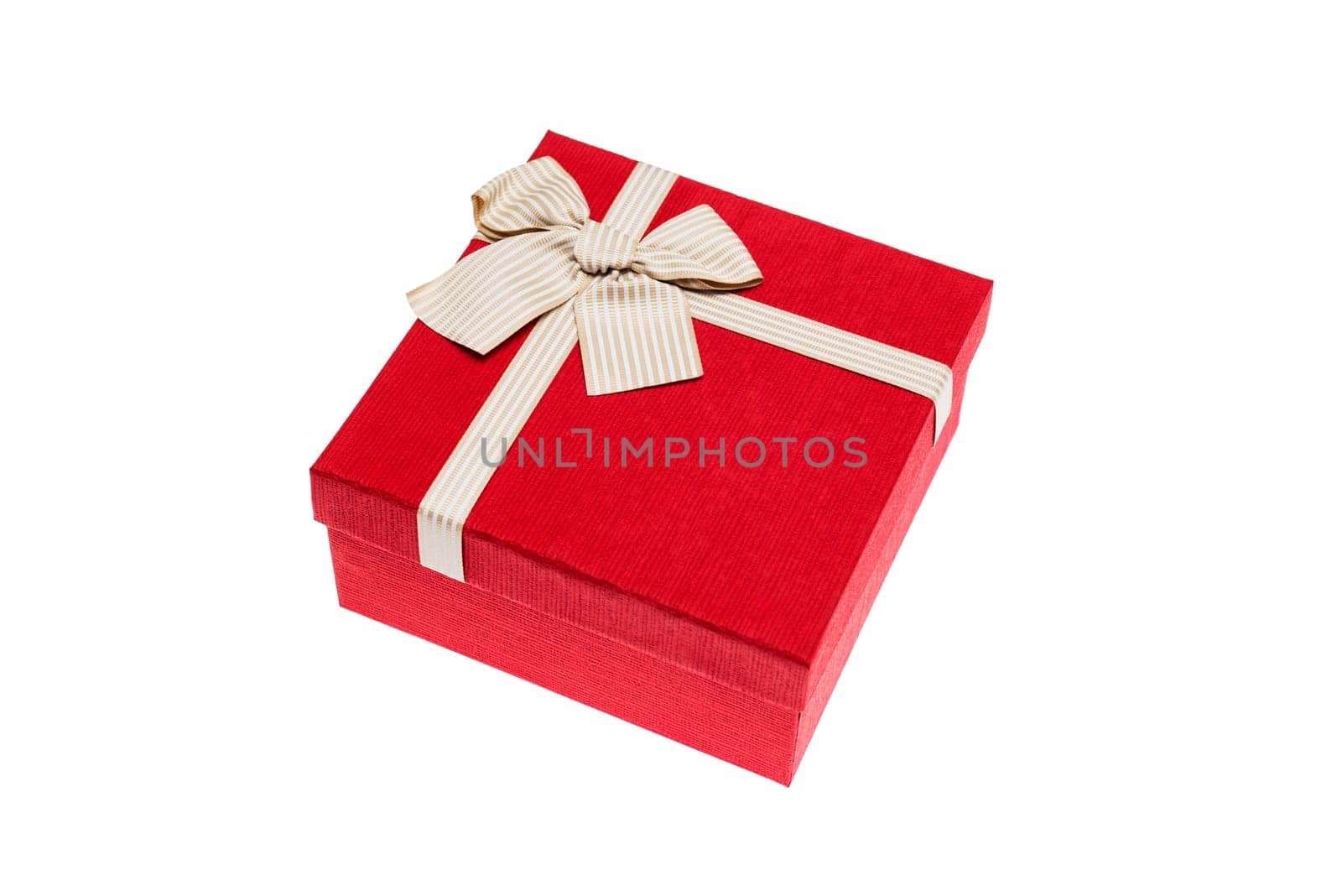 Red gift box with gold ribbon and bow isolated on white background.