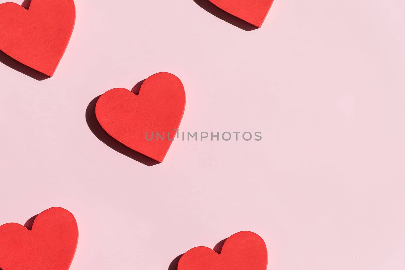 Valentine's Day background. White and red hearts on pastel blue background. Valentines day concept. Flat lay, top view, copy space