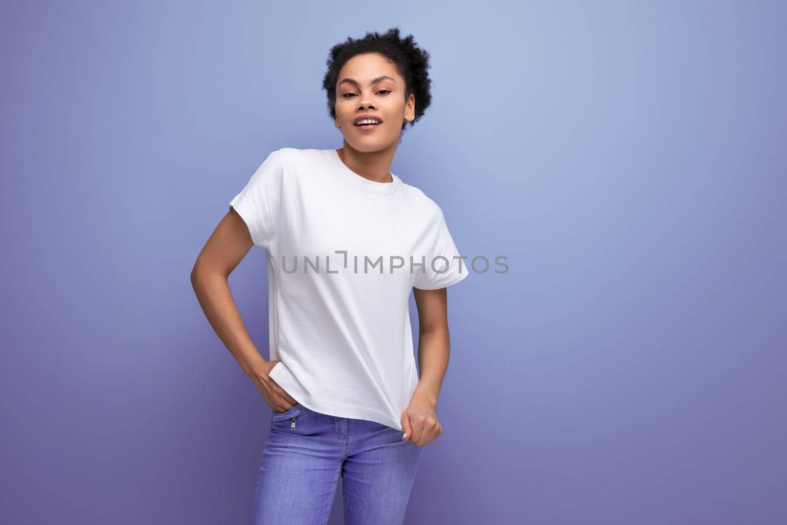 young pretty hispanic business music lover woman in white t-shirt for identity and branding by TRMK