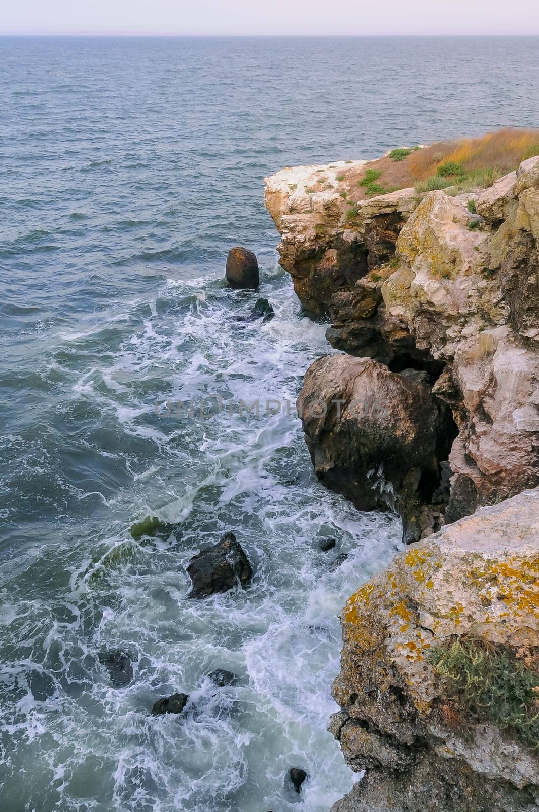 The steep stone coast of the Black Sea from Pontic limestones at Kazantip, Eastern Crimea