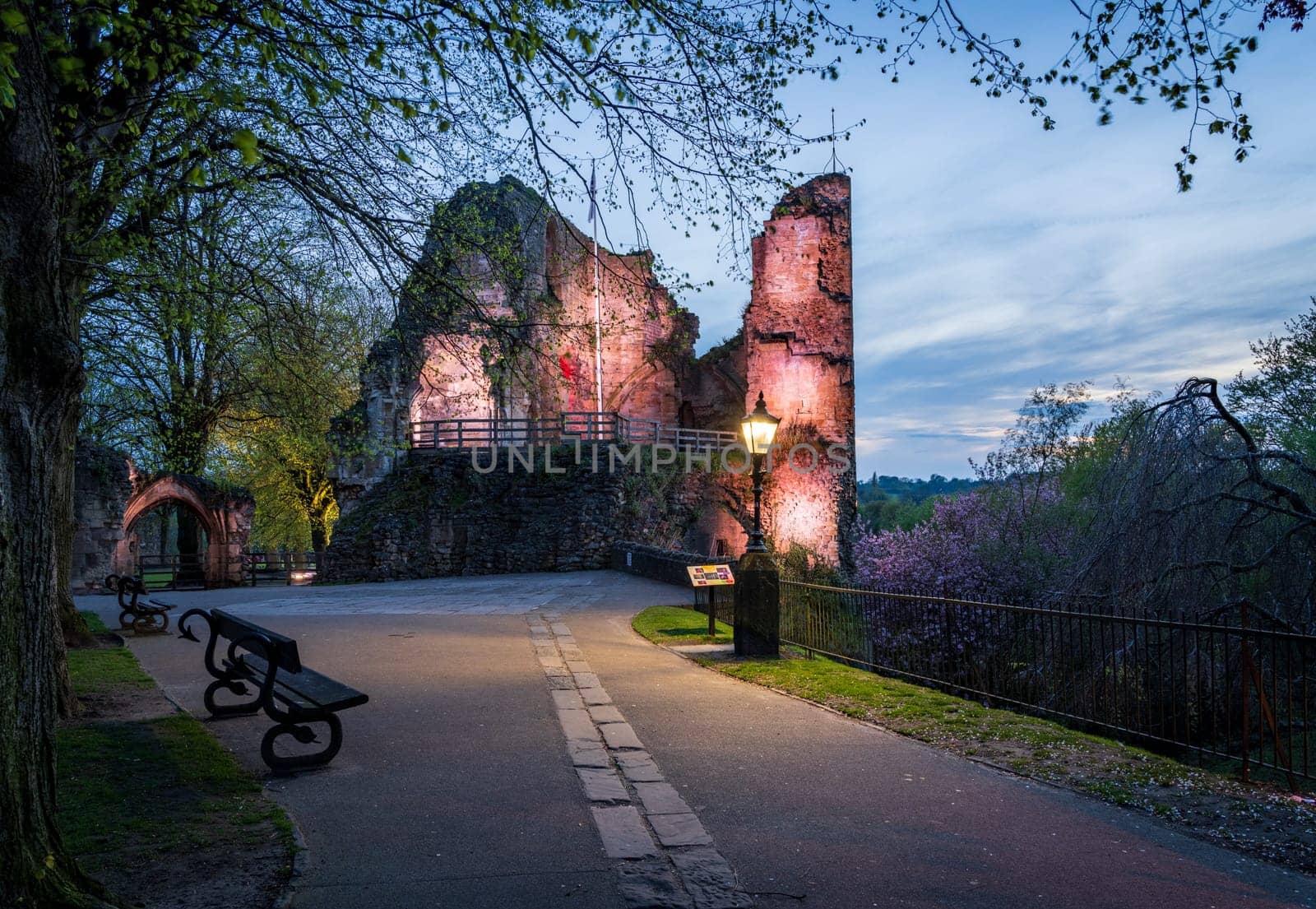 Ancient stone castle walls with keep overlooking river in Knaresborough near Harrogate in Yorkshire