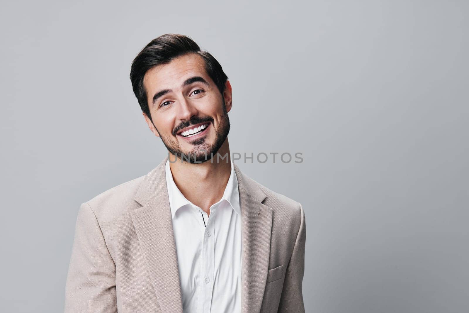 beige man business businessman copyspace smiling isolated suit portrait handsome happy by SHOTPRIME