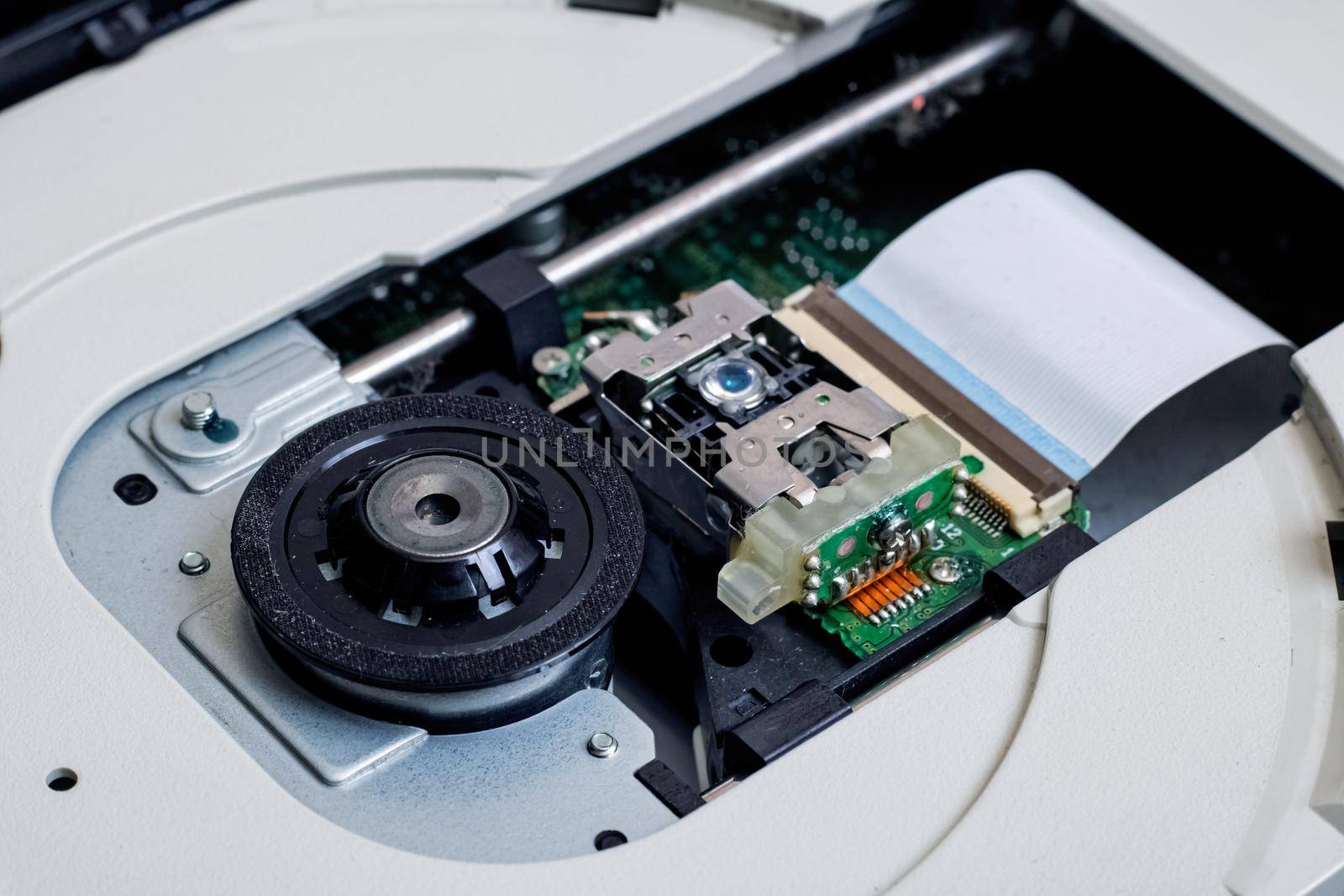 Laser disc reading system inside CD-ROM close up