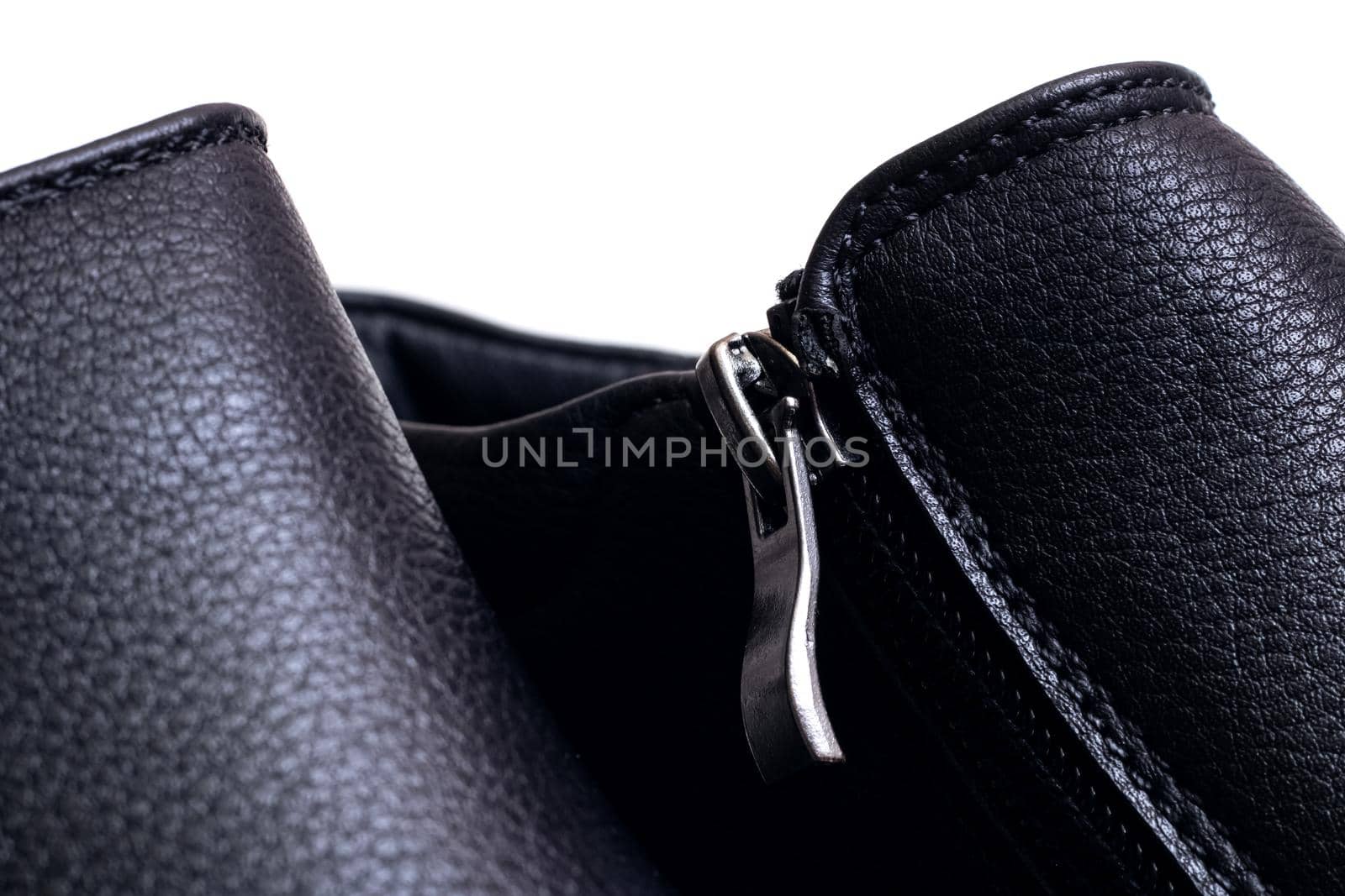 Zipper on men's shoes on a white background close up