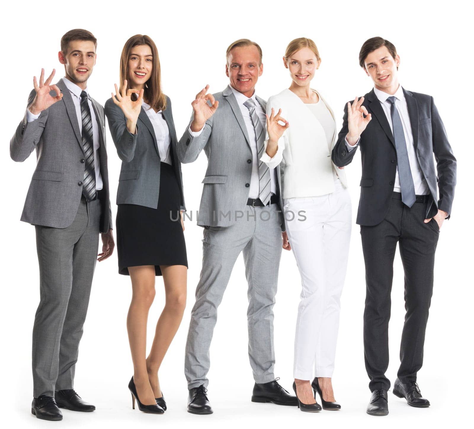 Business team showing ok sign isolated on white background