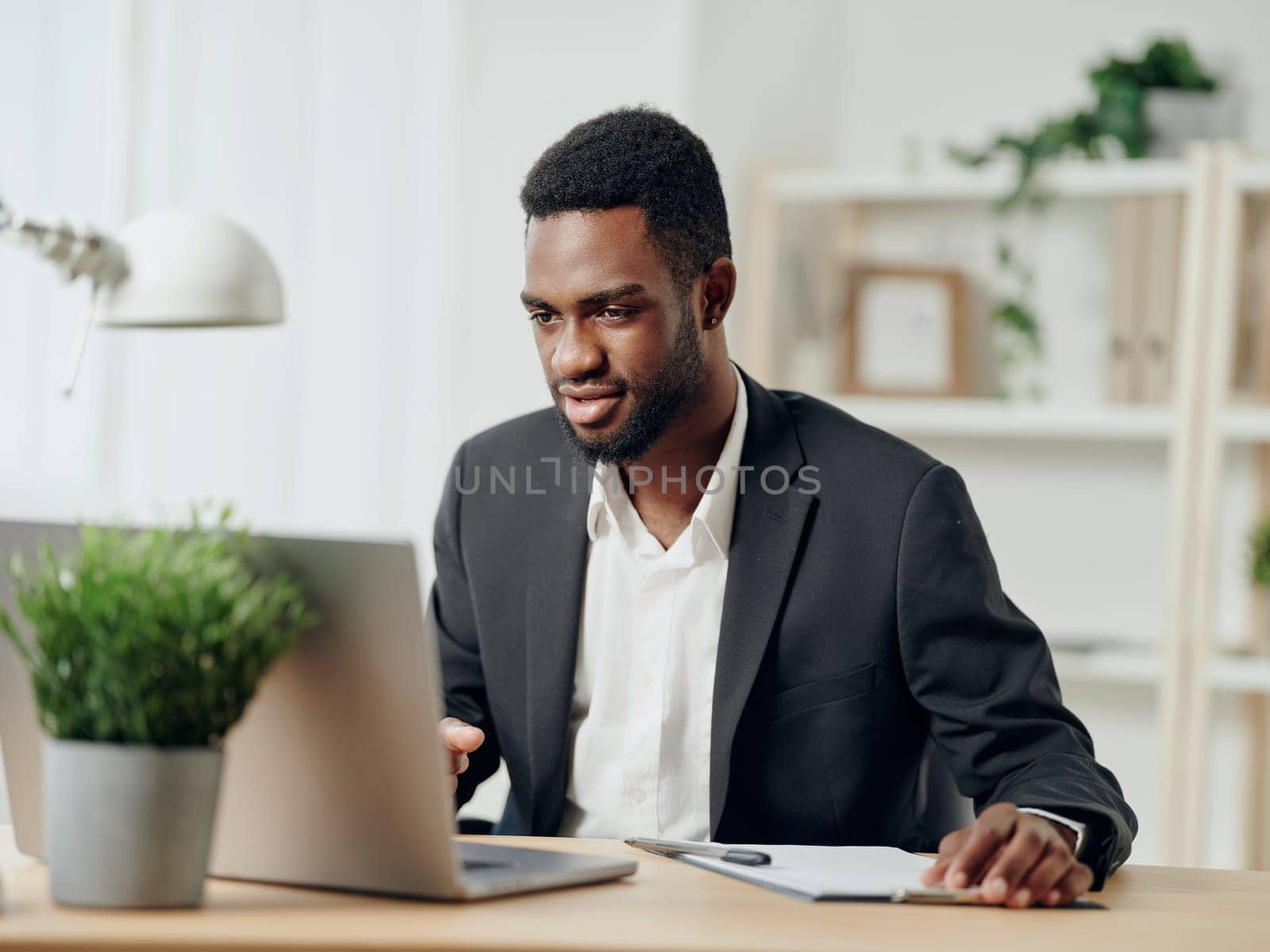 freelance man career internet office cyberspace copy businessman smiling job student american programmer education online laptop workplace computer african distance space work freelancer