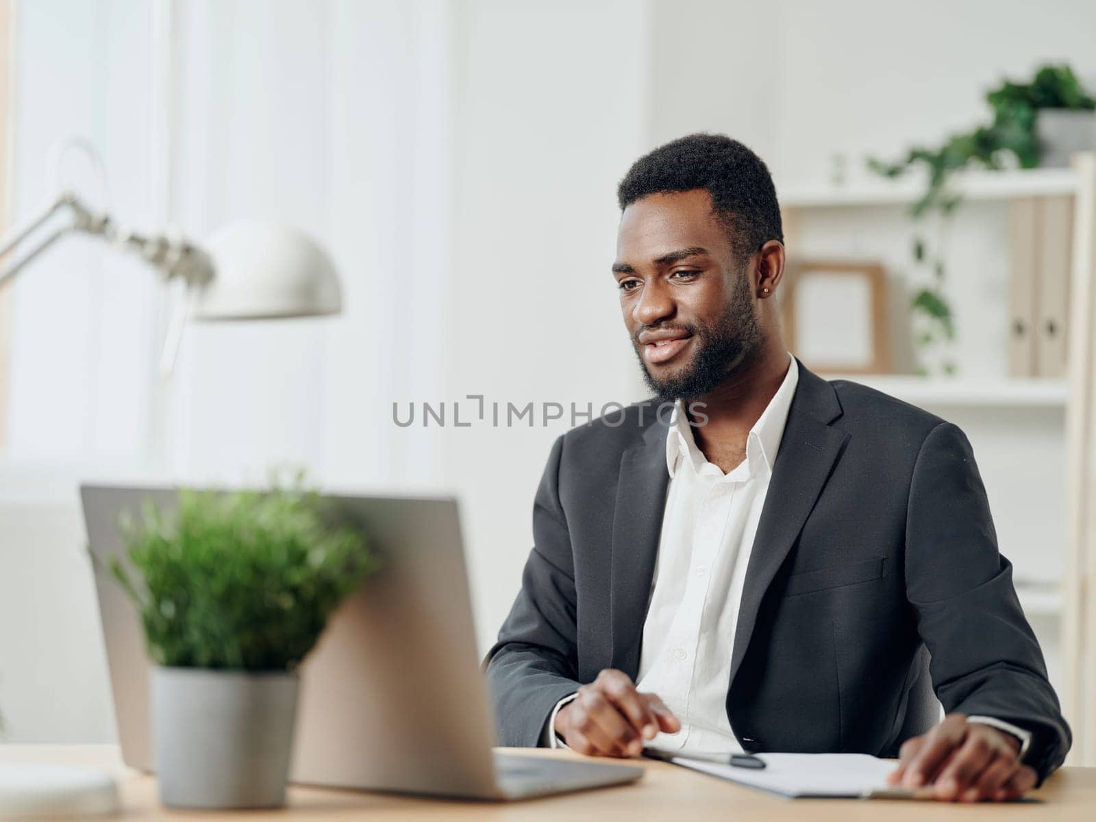 african man education laptop online computer work american job student office freelancer by SHOTPRIME