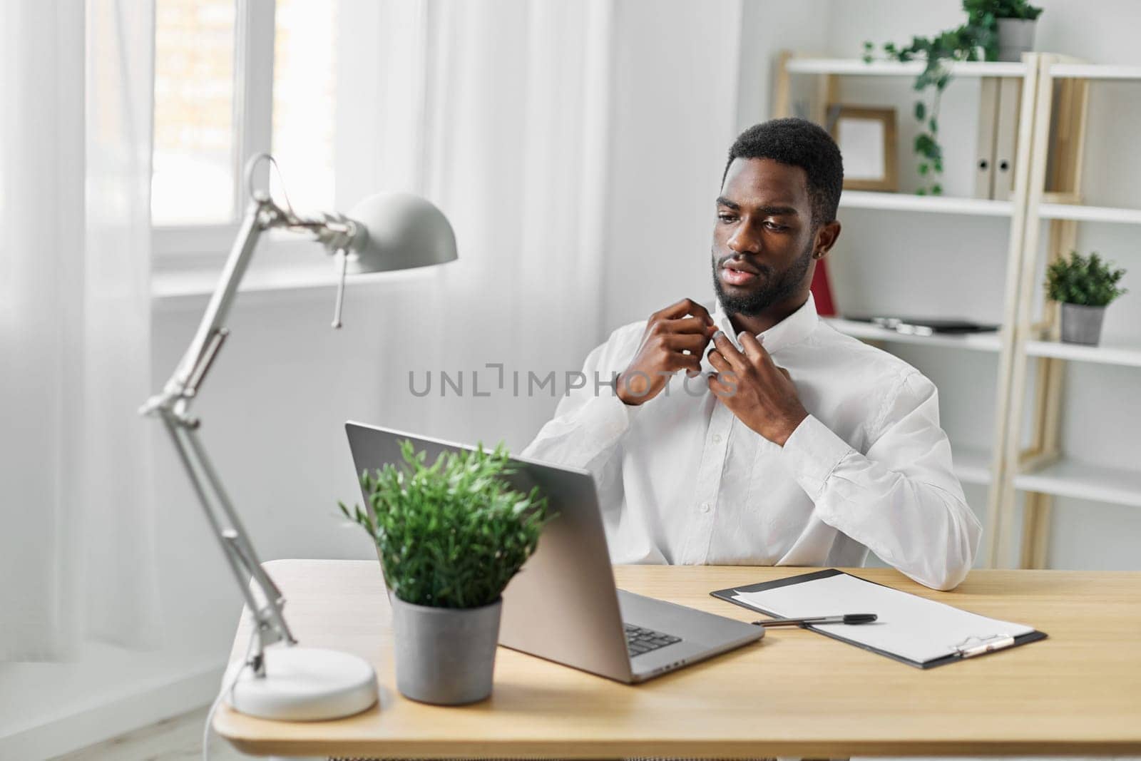 office man call career blank computer entrepreneur african online job distance space laptop smiling student manager worker freelancer black male american business education