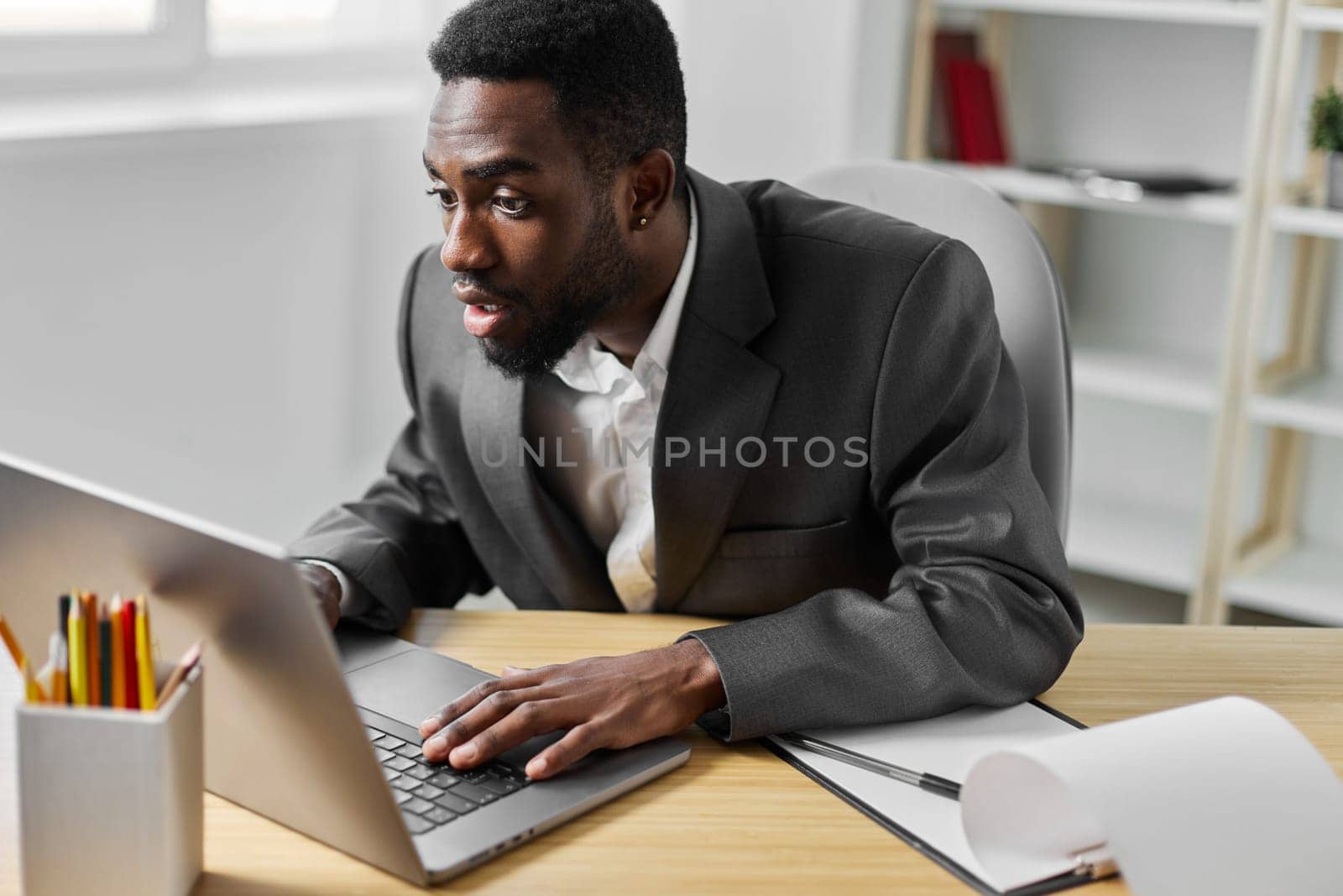 office man male laptop online american education freelancer student computer job african by SHOTPRIME