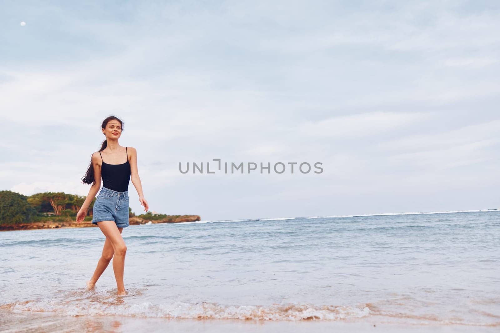 beach woman travel sea running summer young lifestyle sunset wave smile by SHOTPRIME