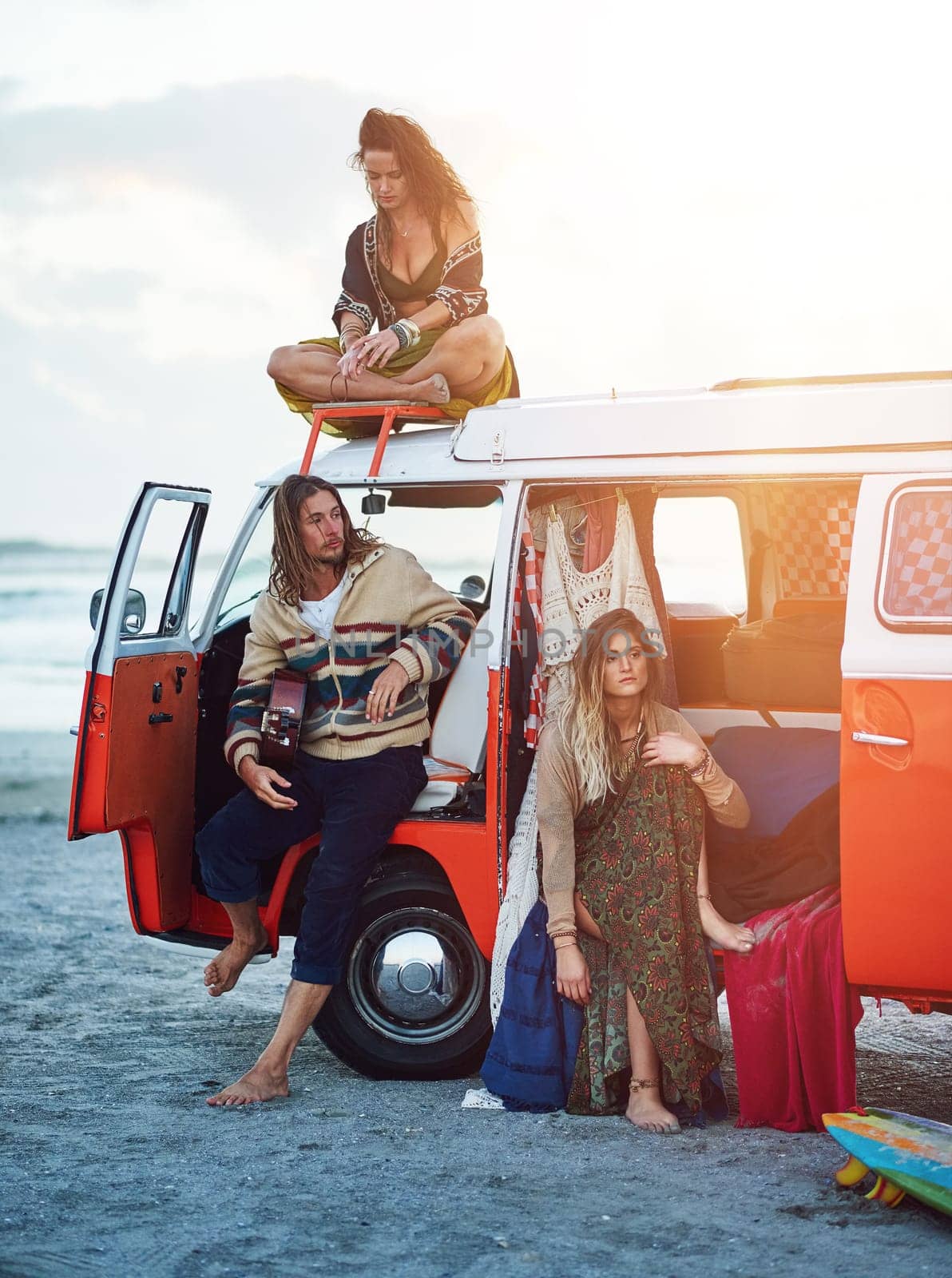 Dropping by the beach. a group of young friends stopping at the beach during a roadtrip