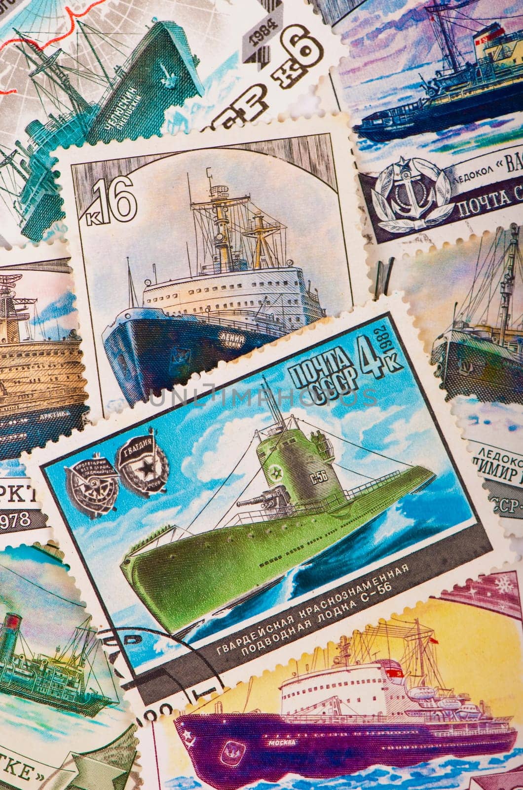 Old soviet military theme stamps, USSR - CIRCA 1984: A stamp printed in USSR Russia , shows the Soviet ships, ice breakers and submarines by aprilphoto