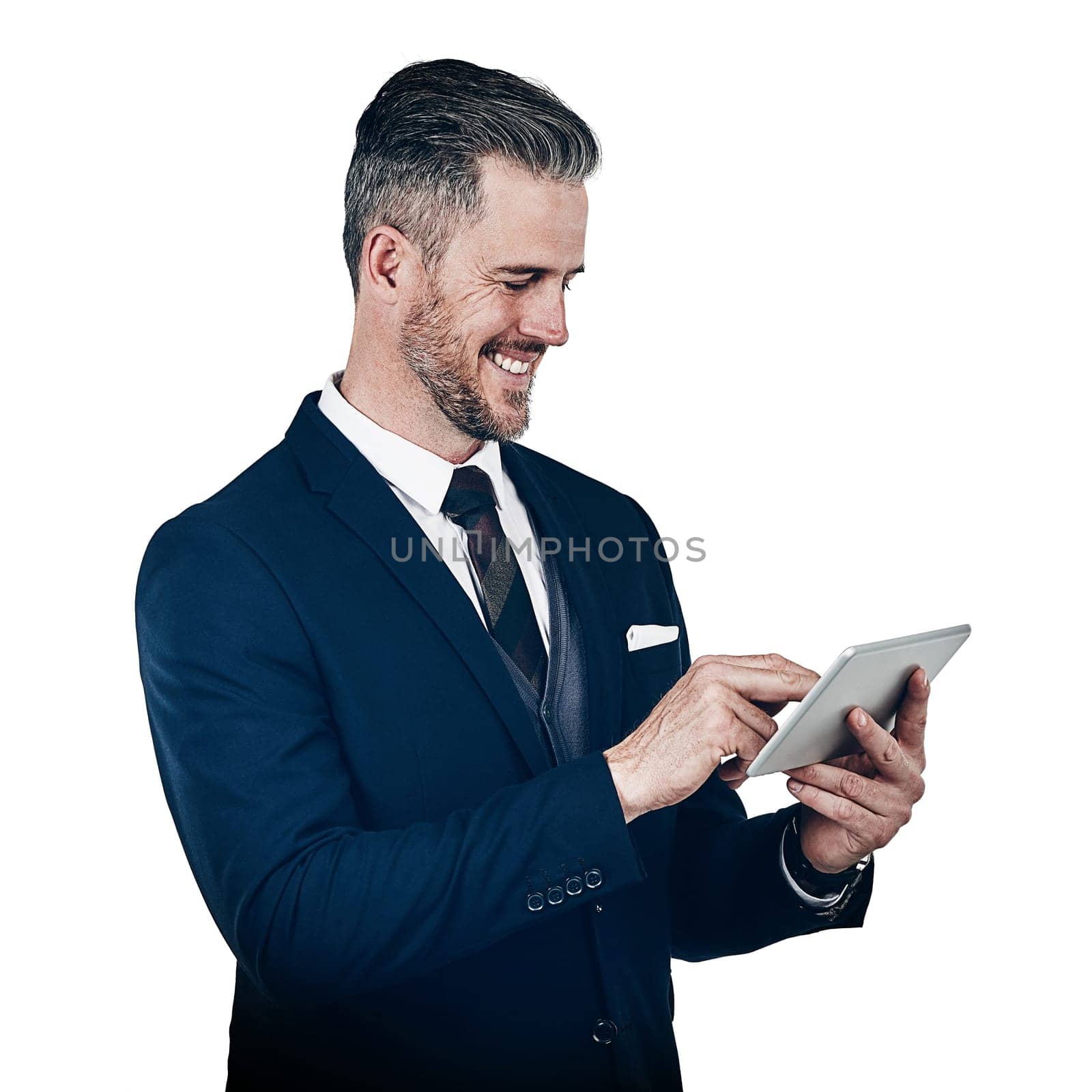 The informed entrepreneur is a successful entrepreneur. Studio shot of a businessman using a digital tablet against a white background. by YuriArcurs