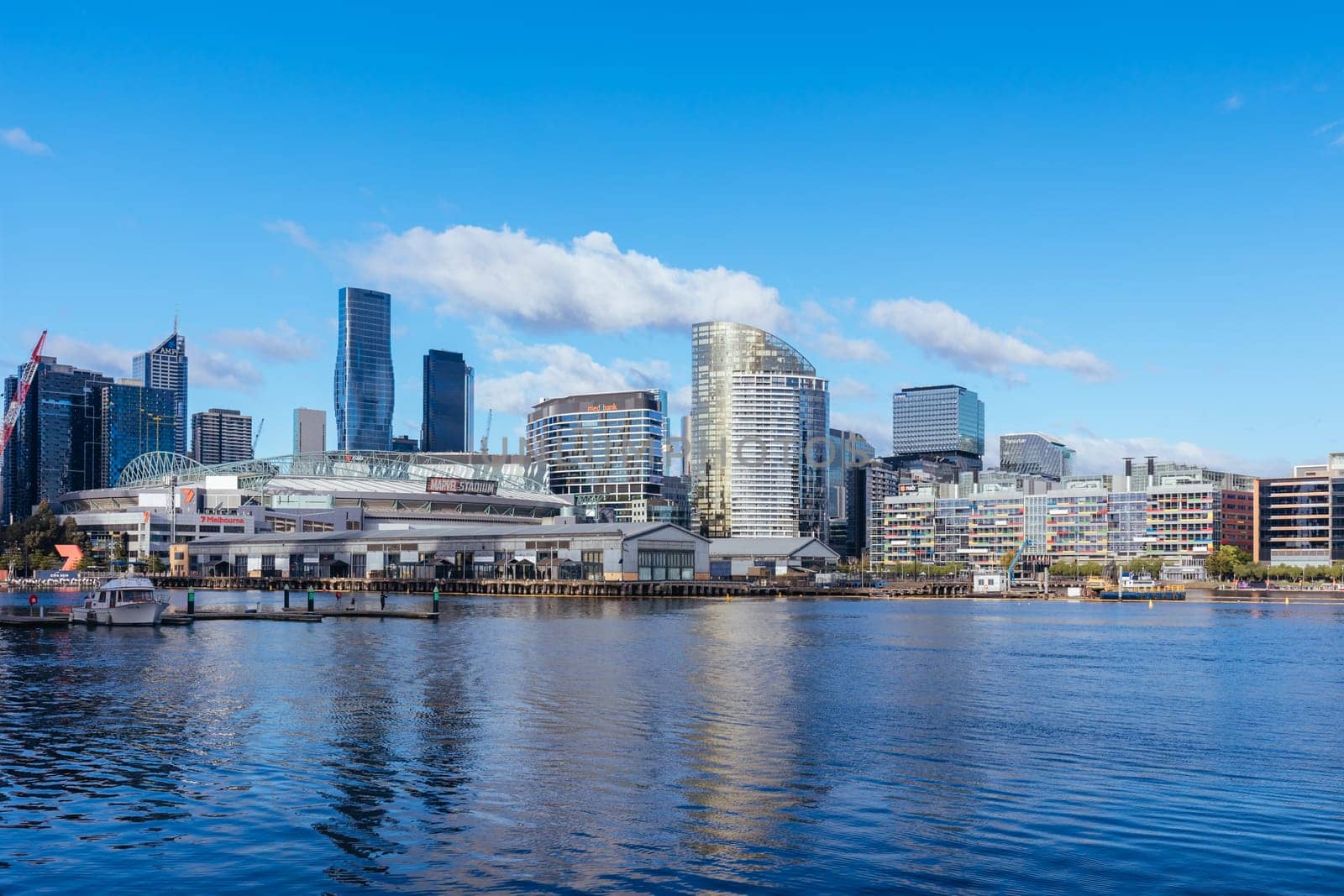 MELBOURNE, AUSTRALIA - JUNE 25: The famous Melbourne skyline from Docklands precinct on a cold winter's day on June 25th 2022