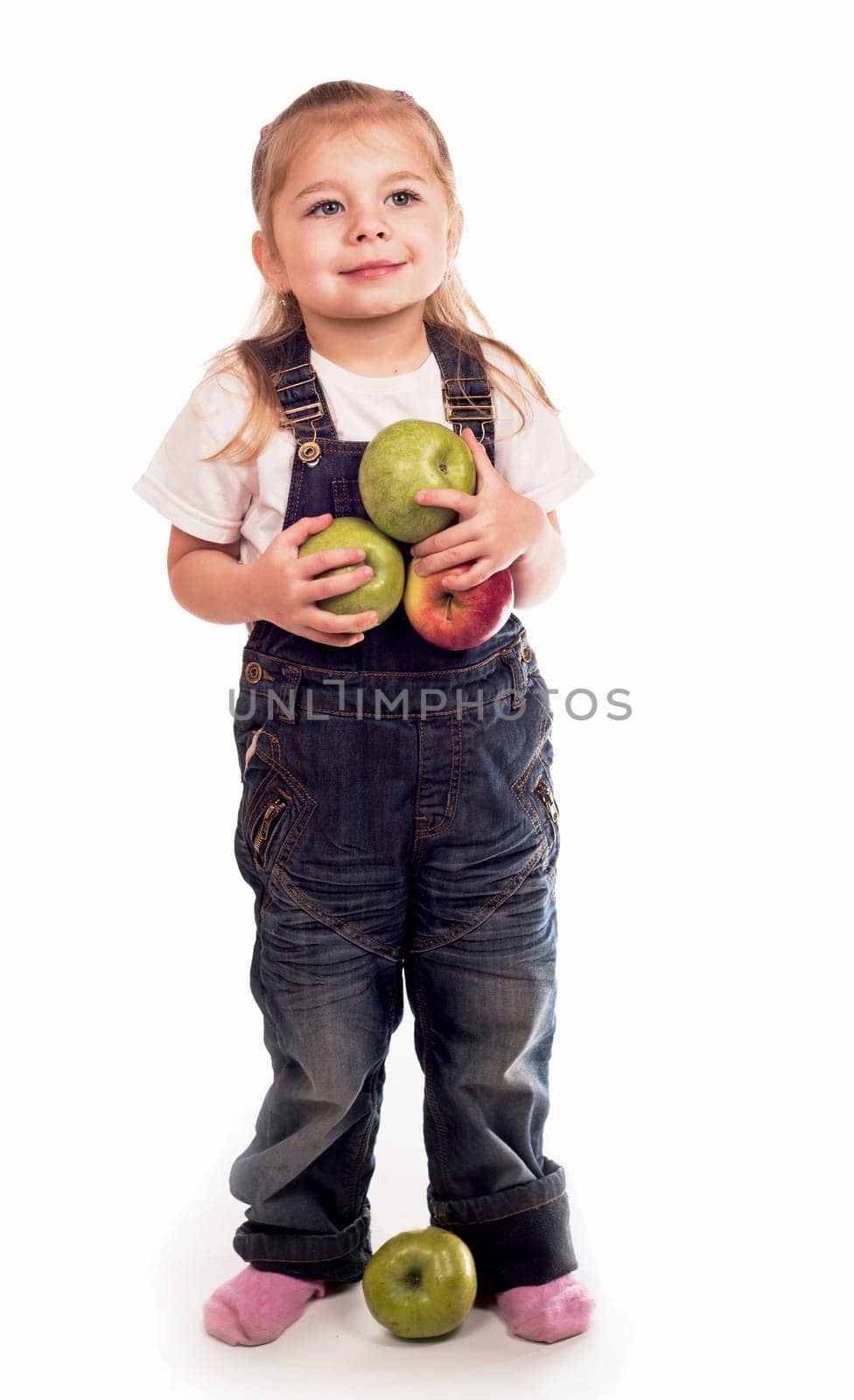 The little girl plays with apples by aprilphoto