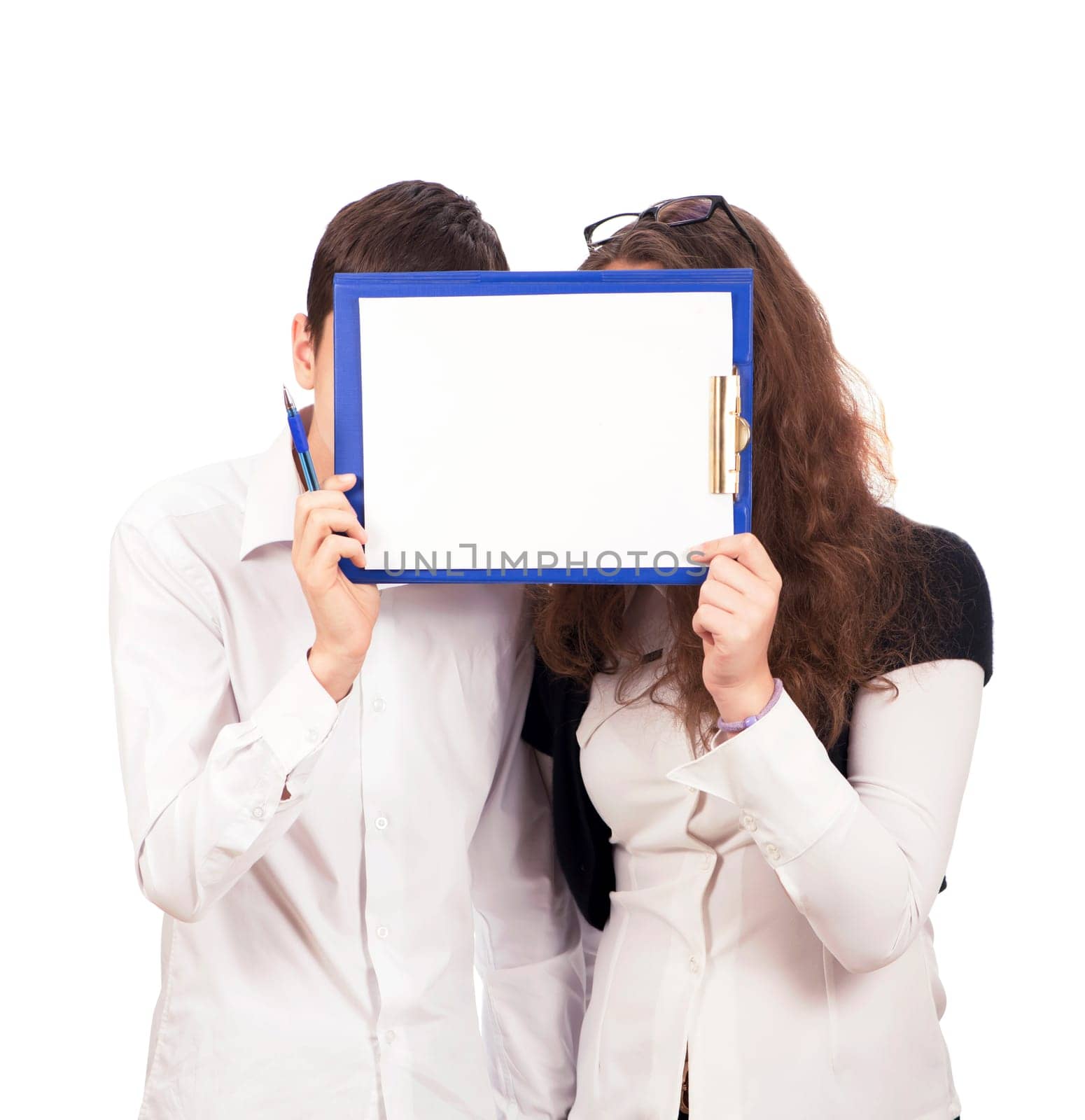 schoolchildren, a girl and a boy are holding a tablet with a blank page, space for text by aprilphoto