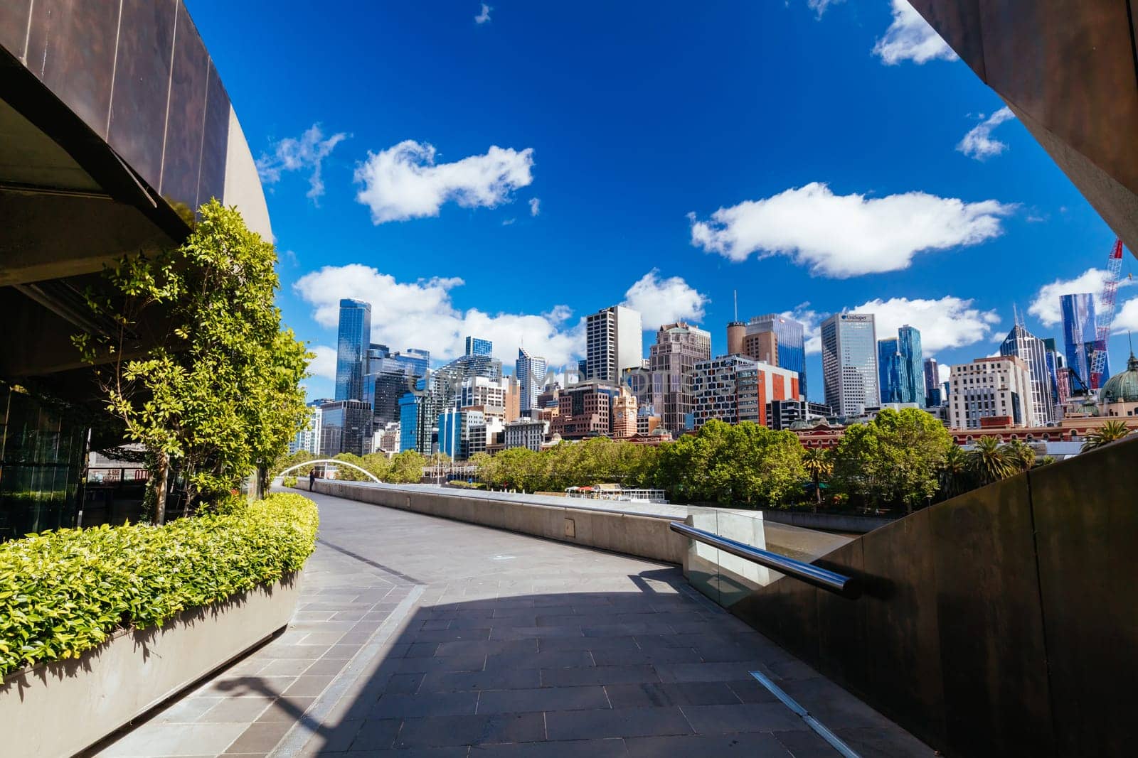 MELBOURNE, AUSTRALIA - OCTOBER 31, 2021: Views towards Melbourne CBD and Southbank along the Yarra River in Melbourne, Victoria, Australia