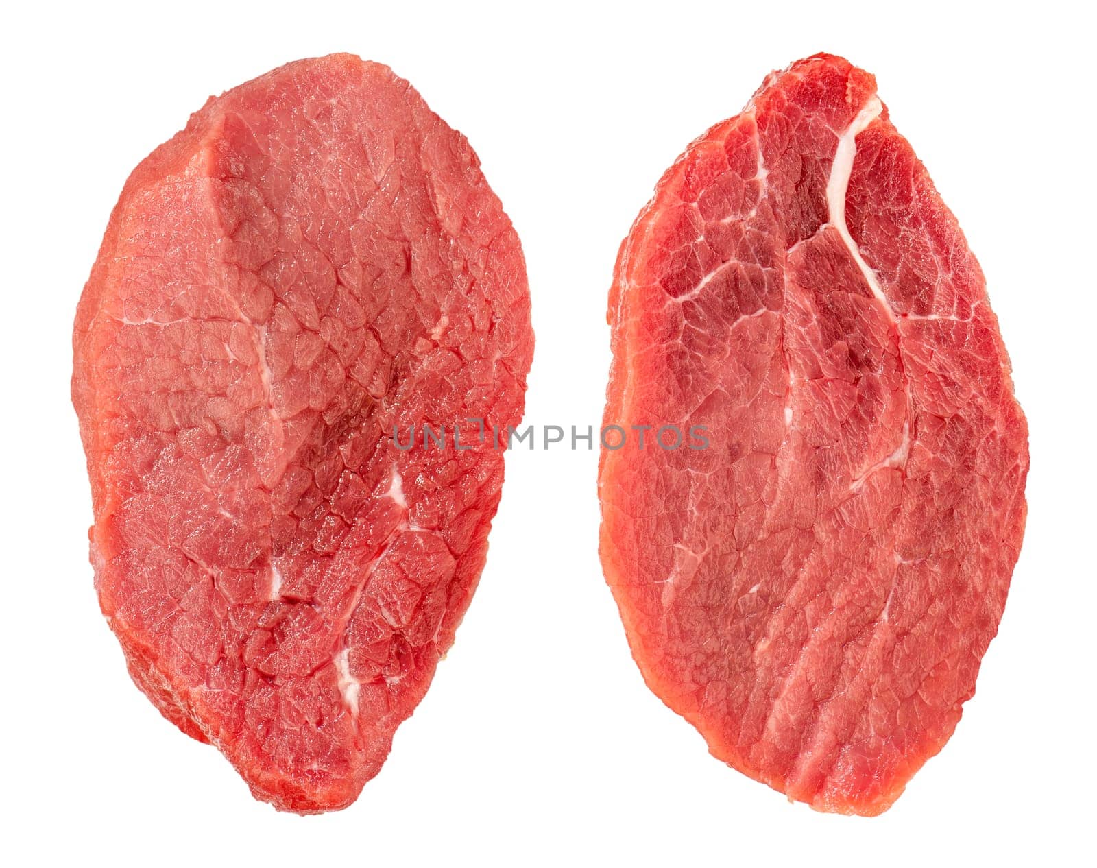 Two pieces of beef meat. Large pieces of beef with thin layers of fat, isolated on a white background. The texture of beef meat close-up, for inserting into a design, project or advertising banner