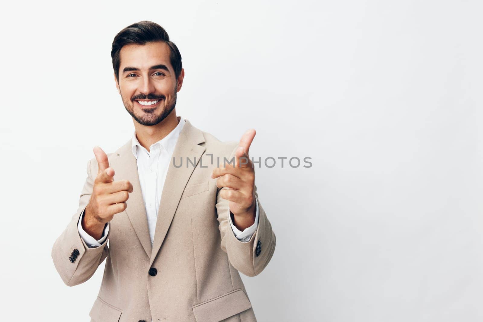 man up business winner victory arm businessman suit beige hand happy by SHOTPRIME