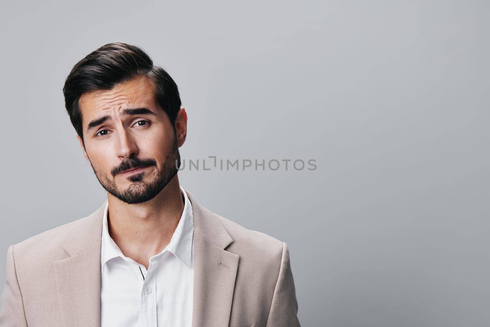 man happy stylish copyspace formal guy posing handsome beige business confident suit sexy portrait crossed businessman success corporate smiling isolated young