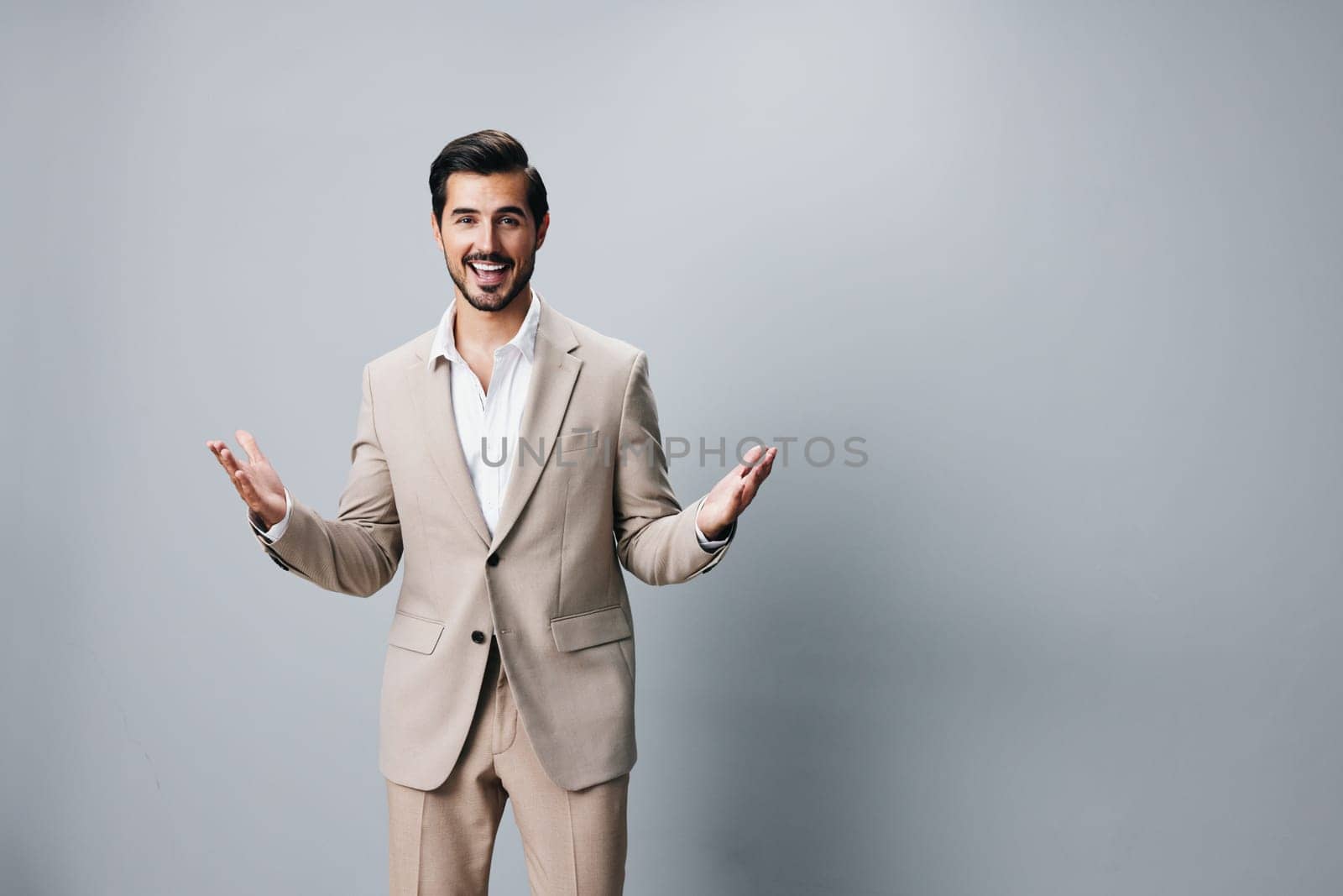 man happy beige copyspace suit smiling attractive businessman handsome business portrait by SHOTPRIME