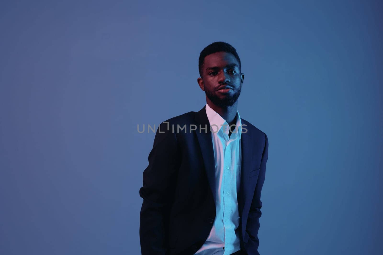 model man art african portrait expression color light neon businessman studio by SHOTPRIME