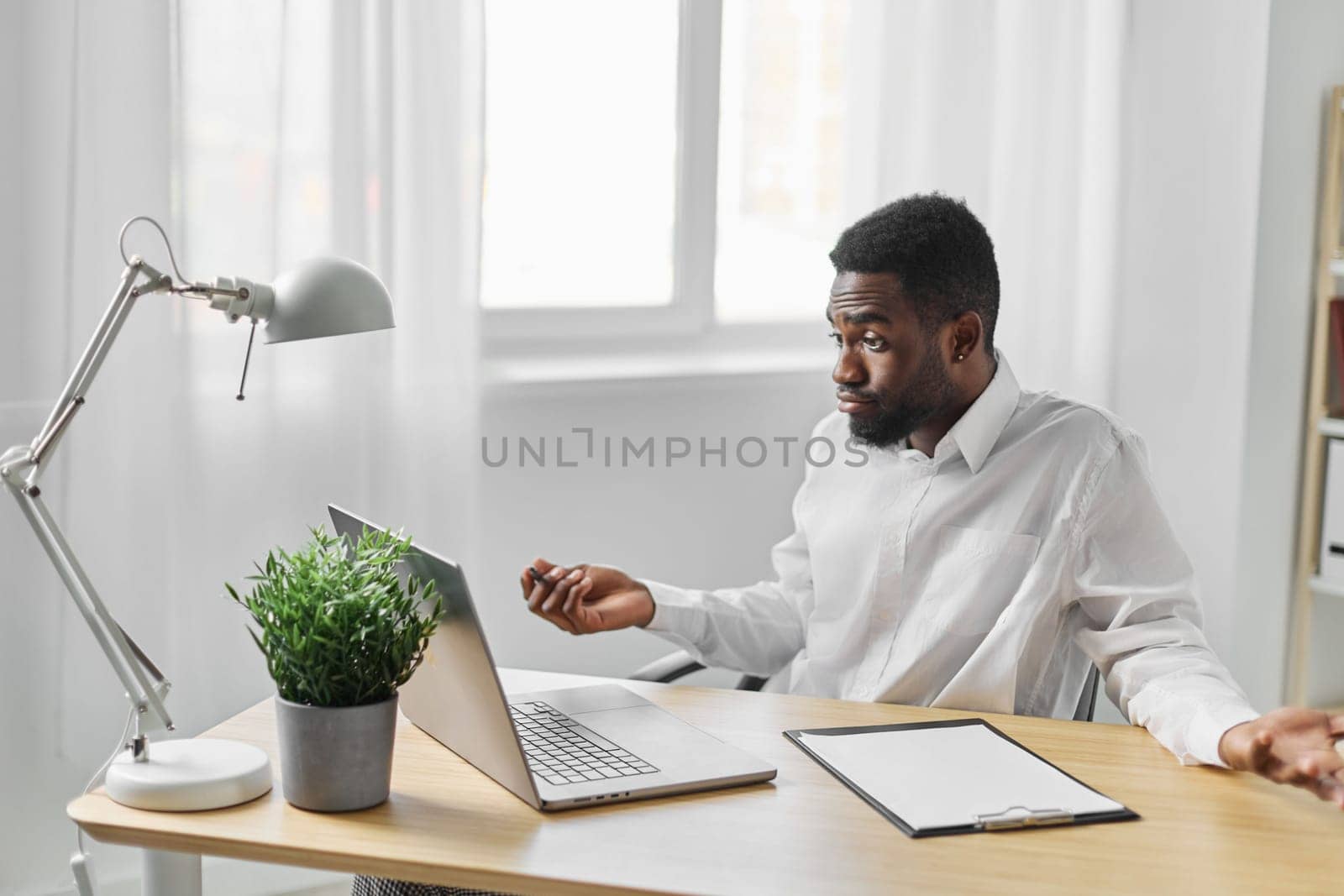 office man conference home student blank indoor distance cyberspace education african american online career young desk african web space laptop computer freelancer job