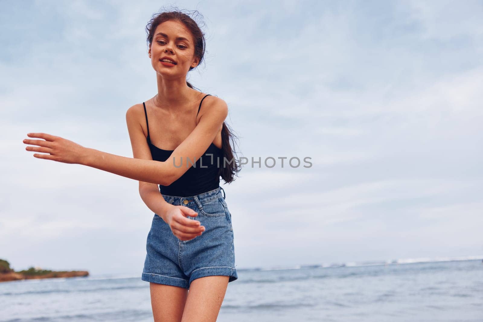 woman ocean sunset smile sea wave travel running tan shore happy summer nature smiling sexy young leisure walking person lifestyle beach
