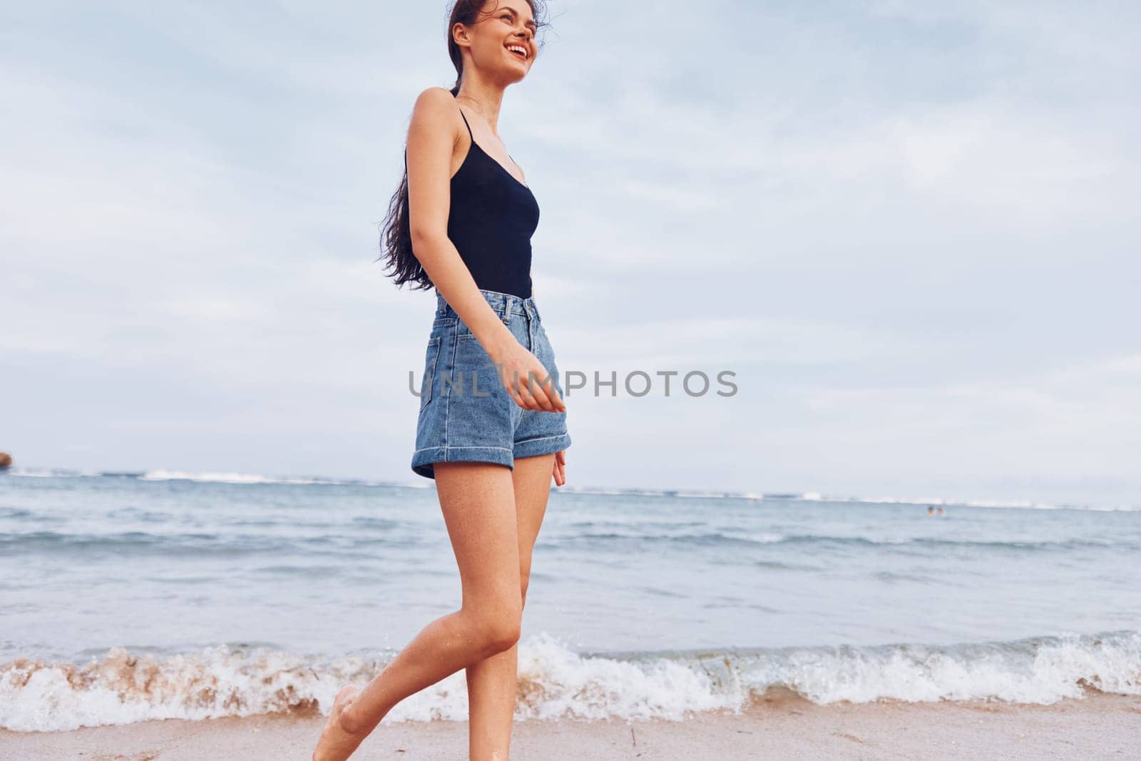 woman sunset summer running beach lifestyle walking travel smile sea young by SHOTPRIME