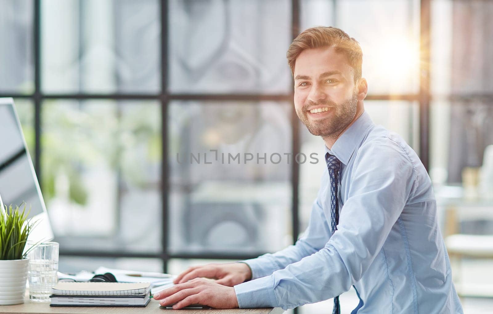 Young businessman working at office