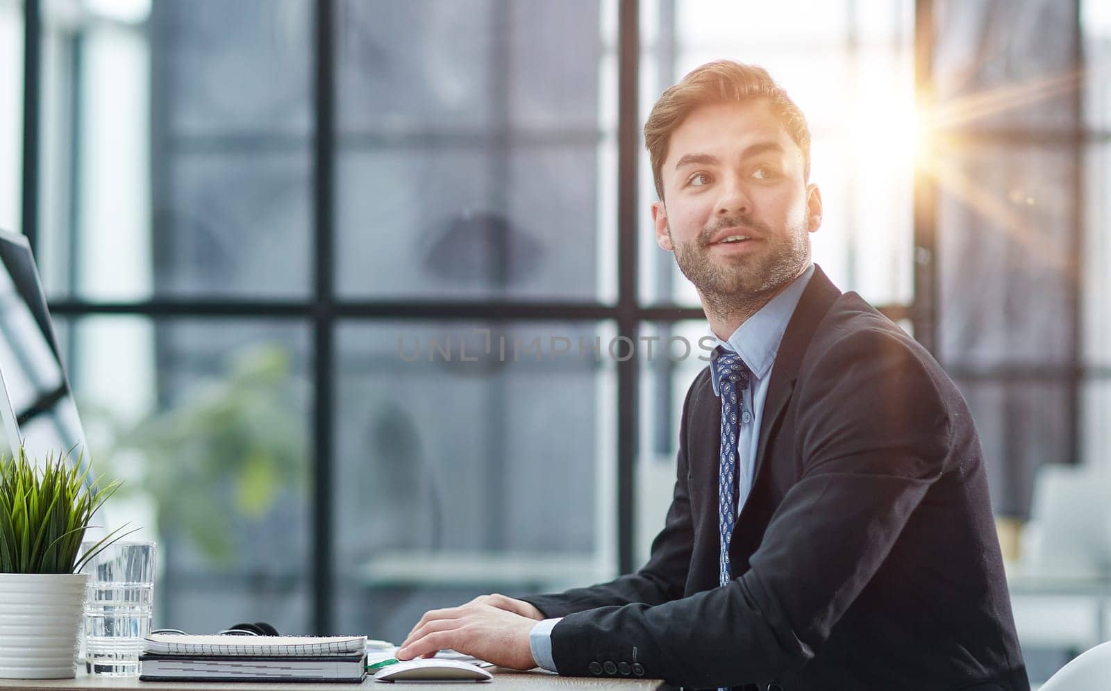 Young businessman working at office