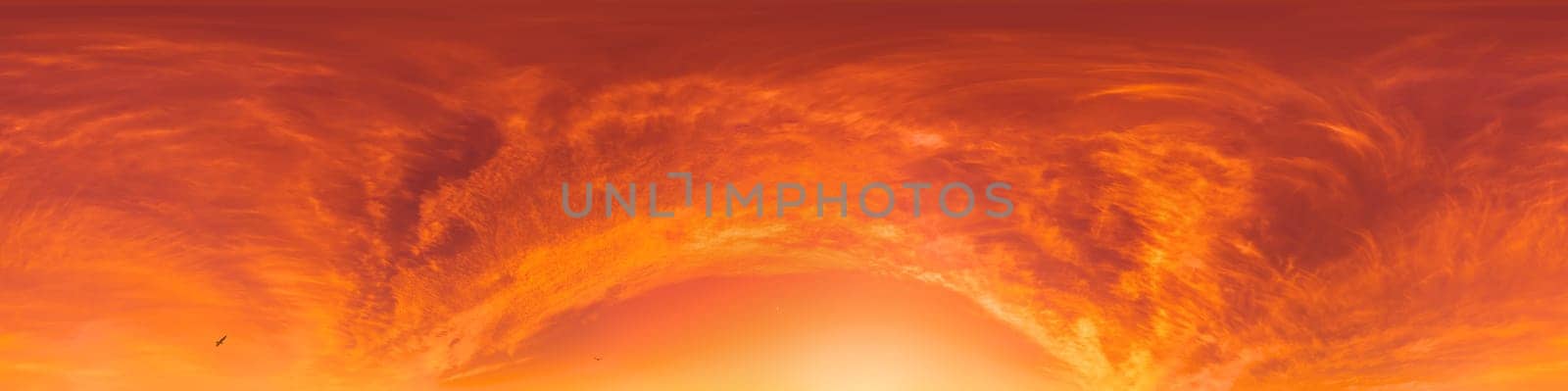 Bright sunset sky panorama with Cirrus clouds. Seamless hdr spherical equirectangular 360 panorama. Sky dome or zenith for 3D visualization, game and sky replacement for aerial drone 360 panoramas.