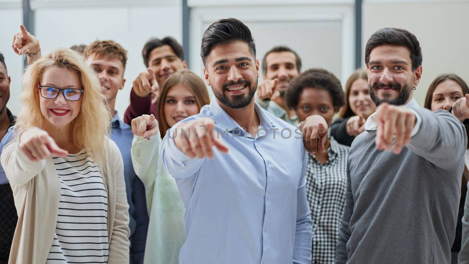 Join a successful team. Young people point to you. business concept
