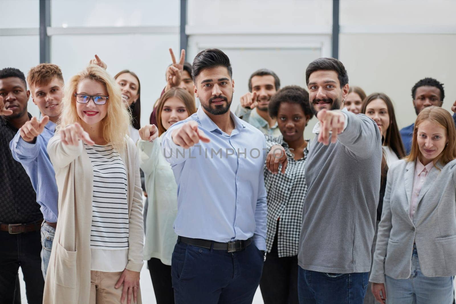 Join a successful team. Young people point to you. business concept
