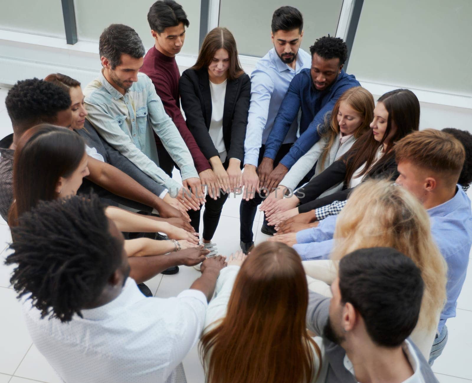 People of different ethnicities uniting to cooperate together