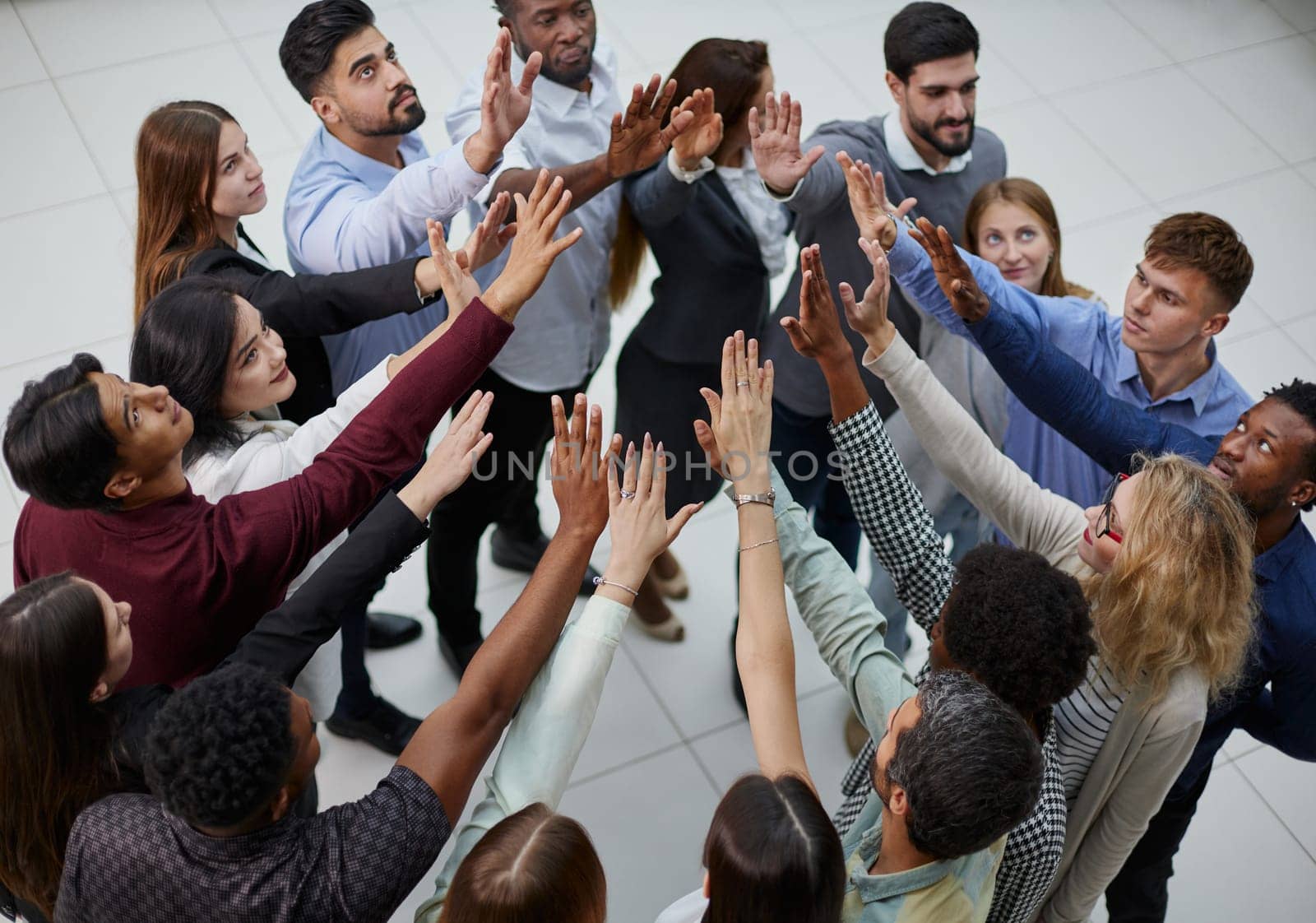 Narrow banner of multiracial people stack hands motivated for shared business success or goal achievement.