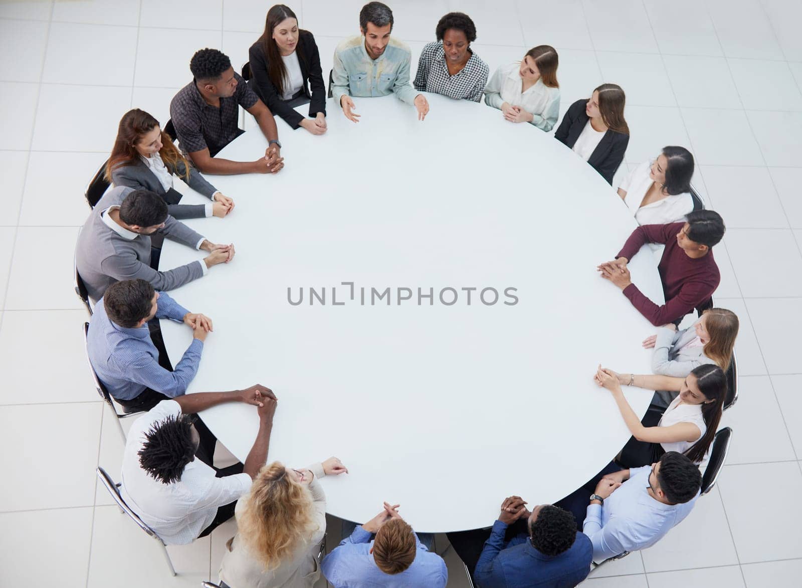 Business people discussing new project at group meeting