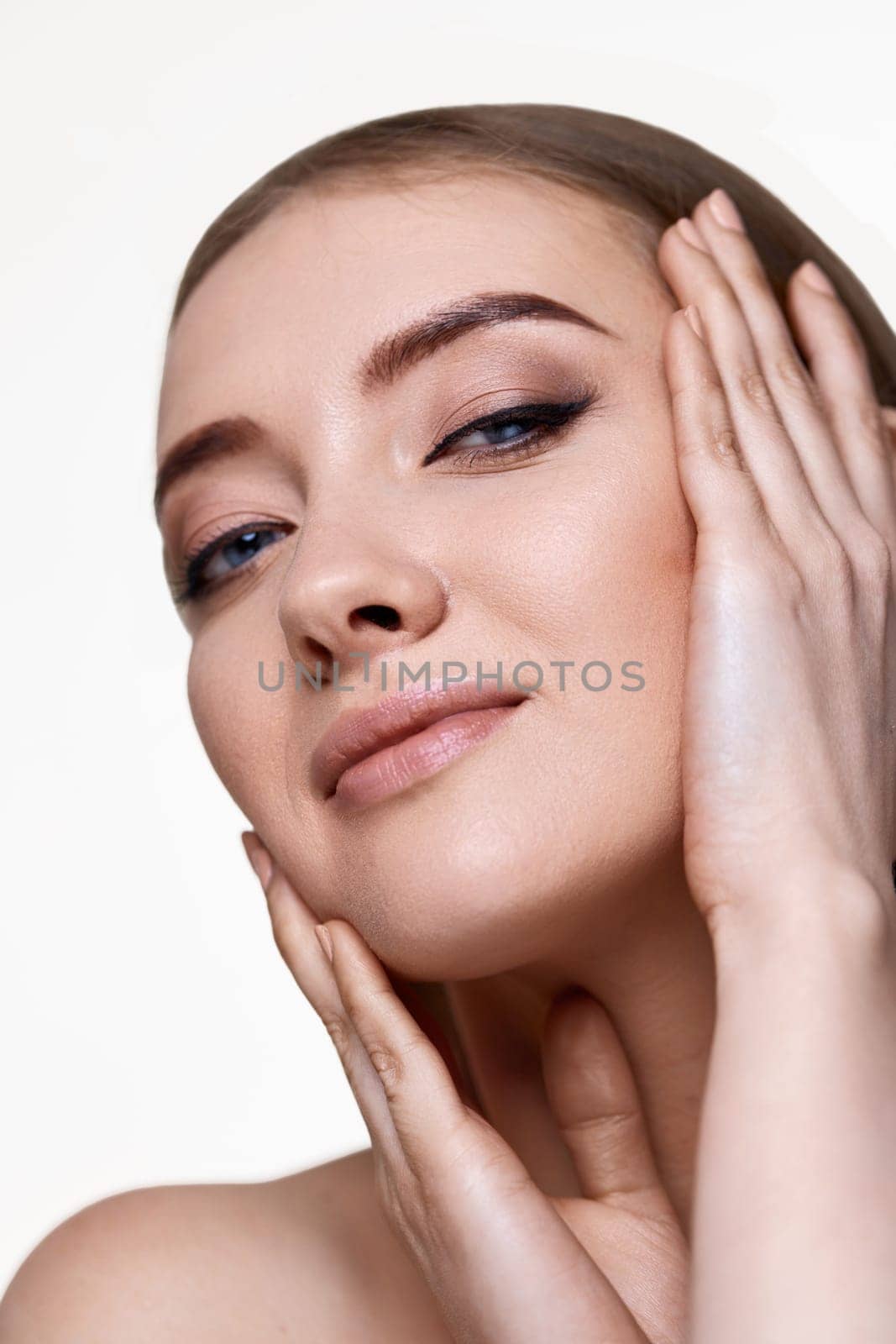 close-up, beautiful woman touching face and enjoy perfect clean skin isolated on white background