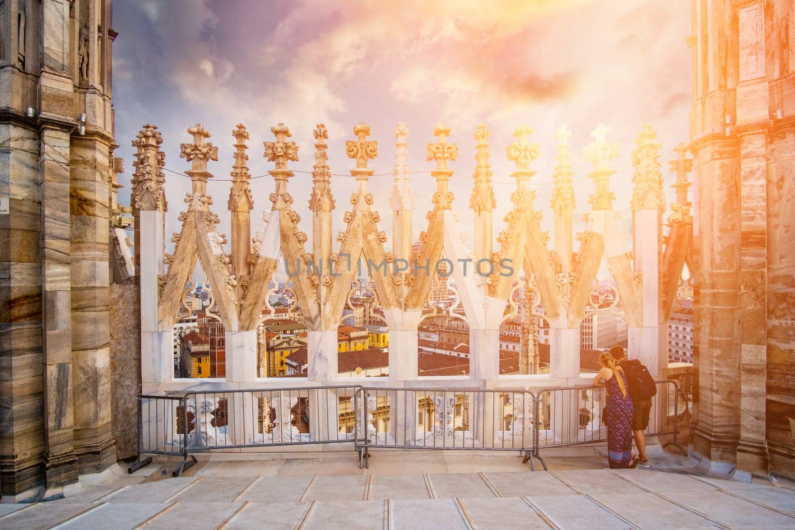 Roof terraces of the famous Duomo Cathedral of Milan against sky