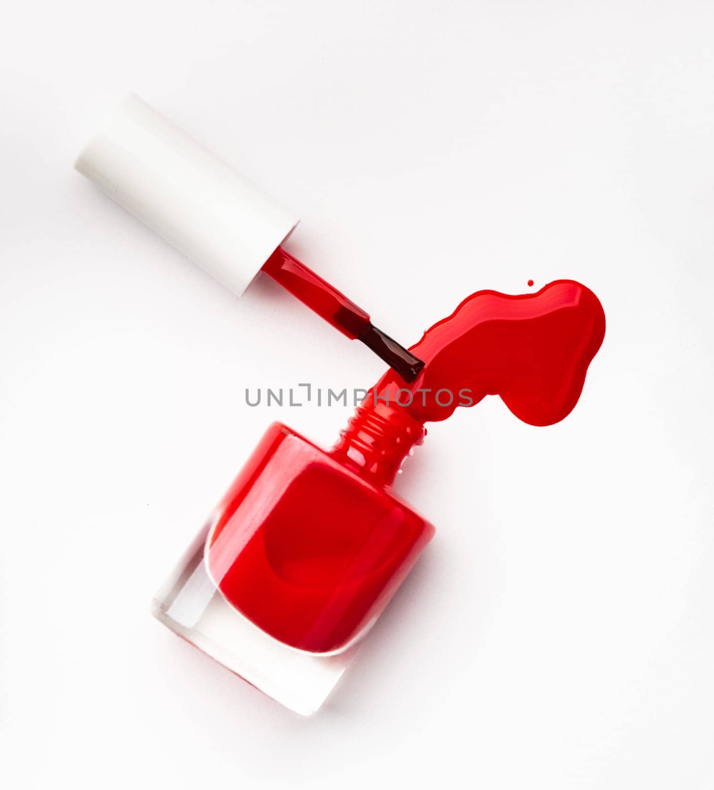 Elegant red nail polish open bottle