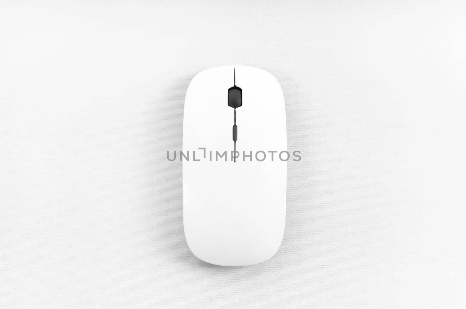 Top view of wireless mouse on white background