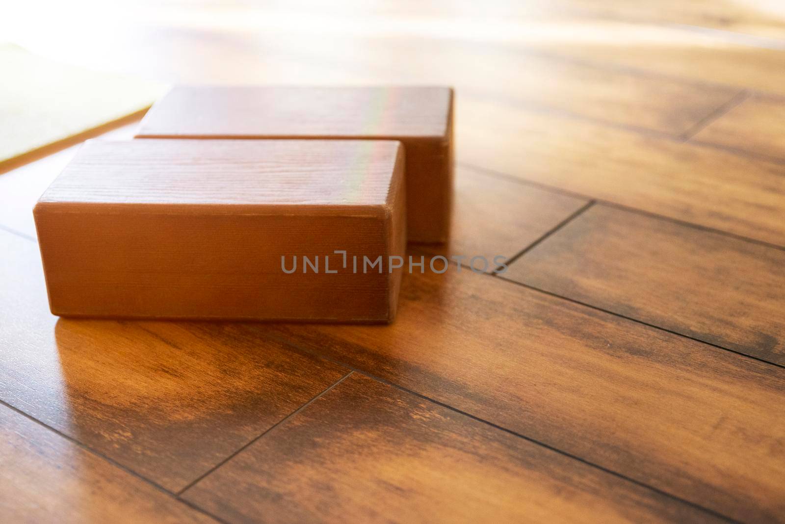 Closeup of wooden blocks yoga equipment in studio