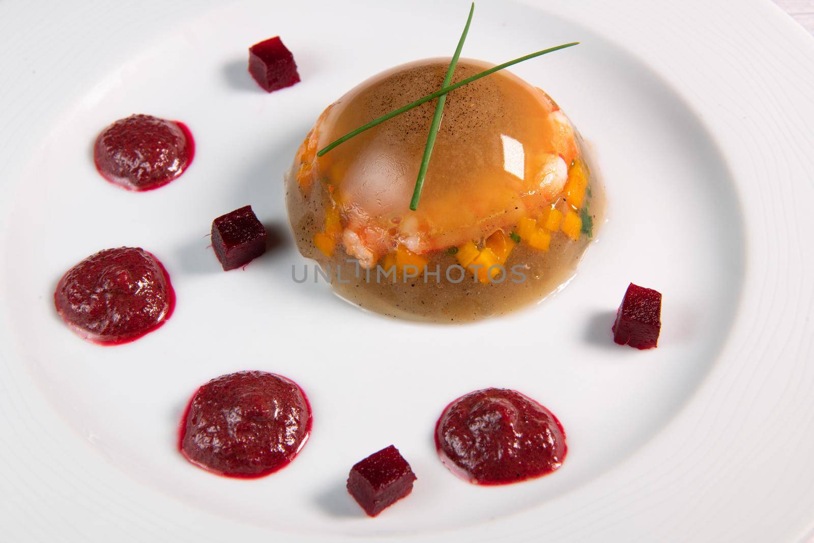Aspic recipe, jelly made from a broth of prawns and peppery beetroot. High quality photo