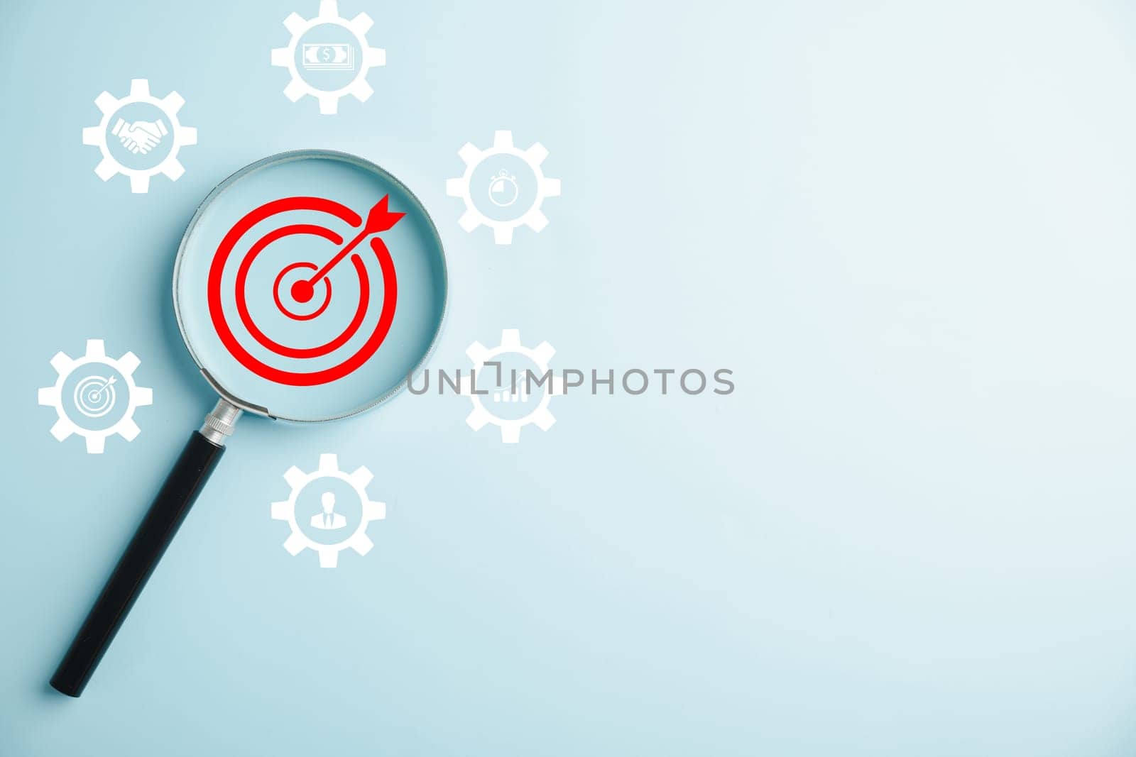 Magnifier to analyze a target icon, offering objective insights and guiding management. It represents the concept of gear planning, development, and propelling business forward.
