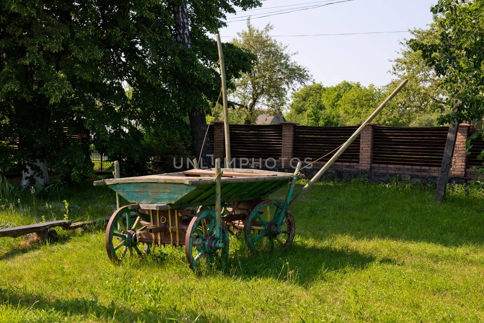 An old wooden vintage cart in rural.