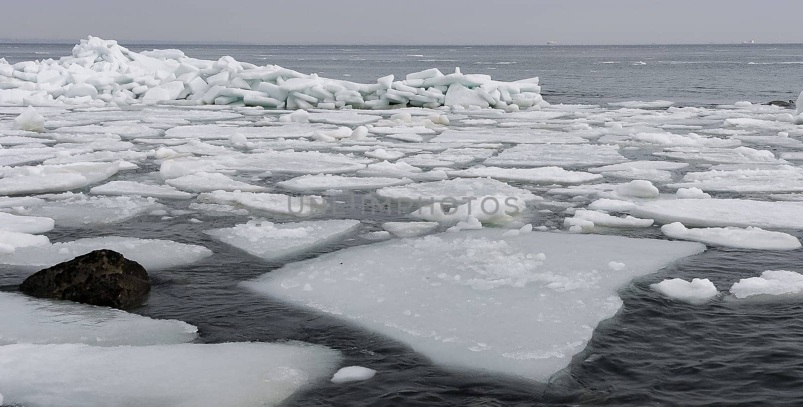 The Black Sea near Odessa is frozen. Ice floes float on the shore