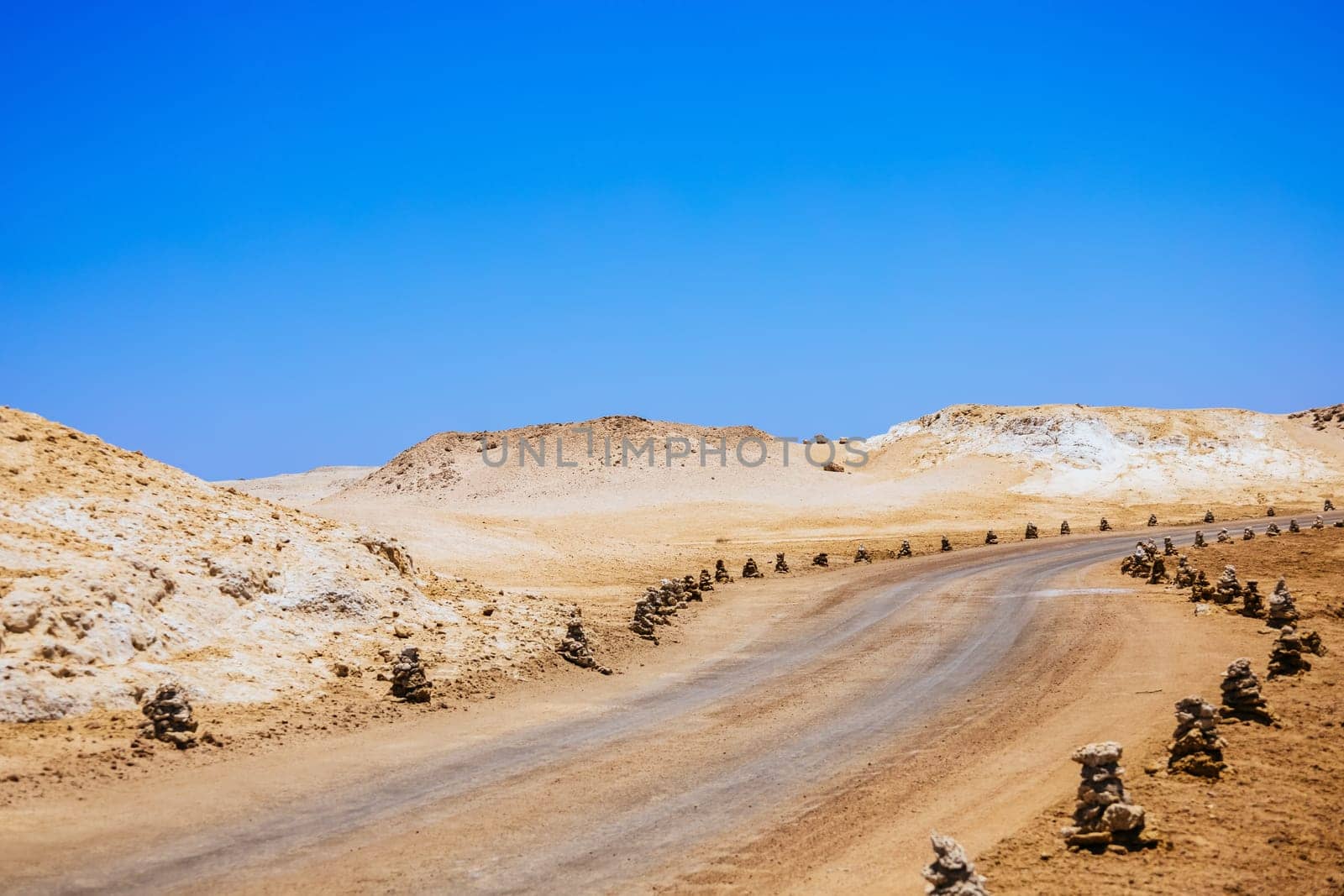 Driveway in Ras Mohamed National Park. Ras Muhammad in Egypt at the southern extreme of the Sinai Peninsula. The road in desert