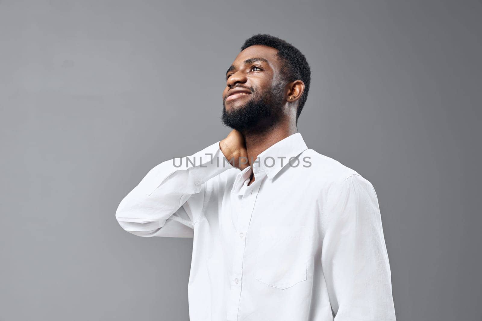 white man smile guy copy arm student african space studio model adult american african emotion young afro happy american background human shirt standing