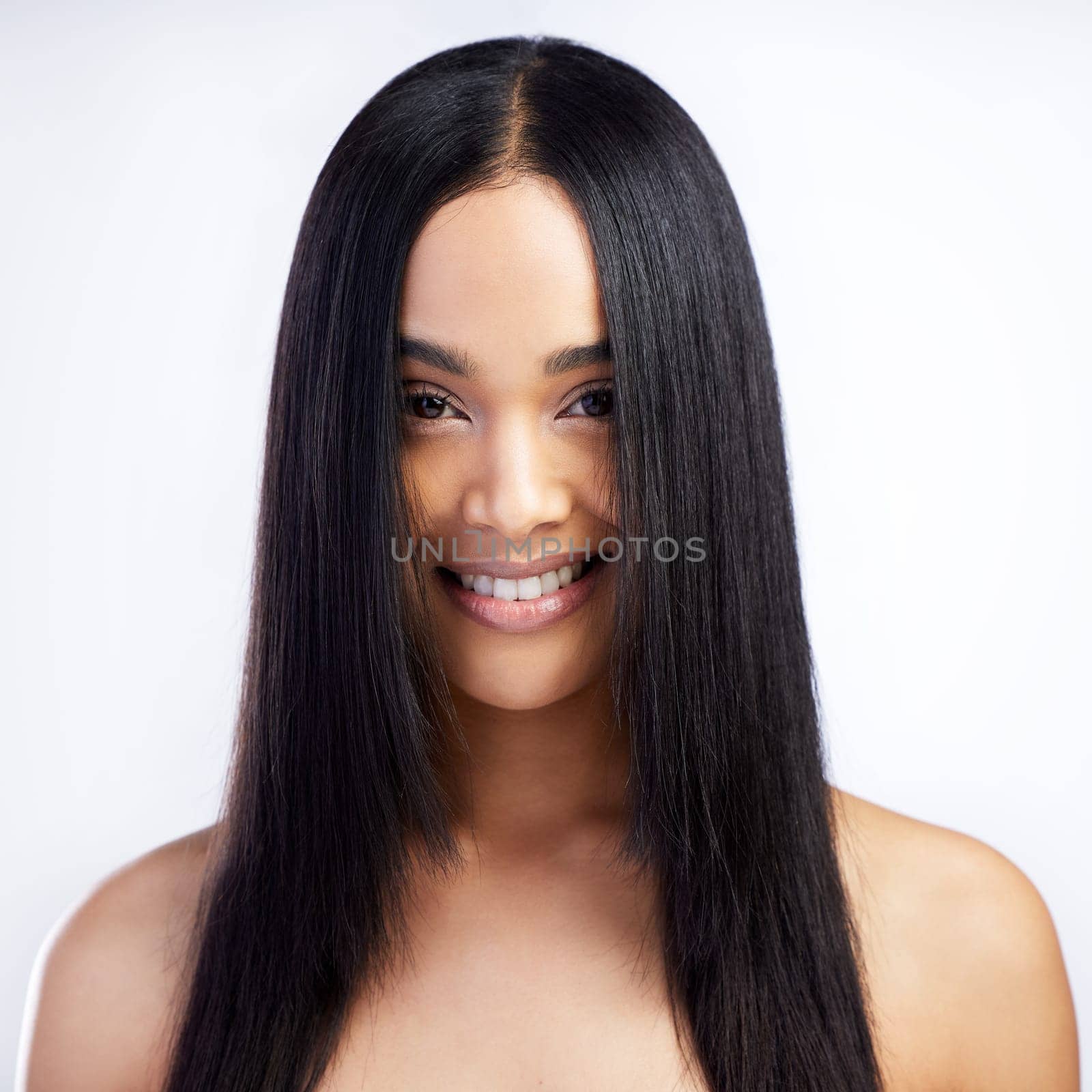 Beauty smile, face and straight hair of woman in studio isolated on a white background for skincare. Portrait, haircare and female model in natural makeup, cosmetics and salon treatment for hairstyle by YuriArcurs