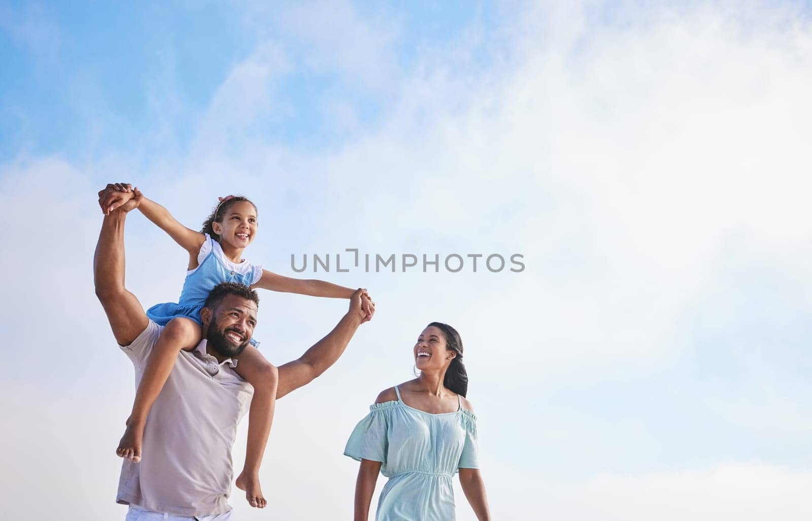 Piggyback, beach or parents walking with a girl for a holiday vacation together with happiness in summer. Holding hands, mother and father playing or enjoying family time with a happy child or kid.